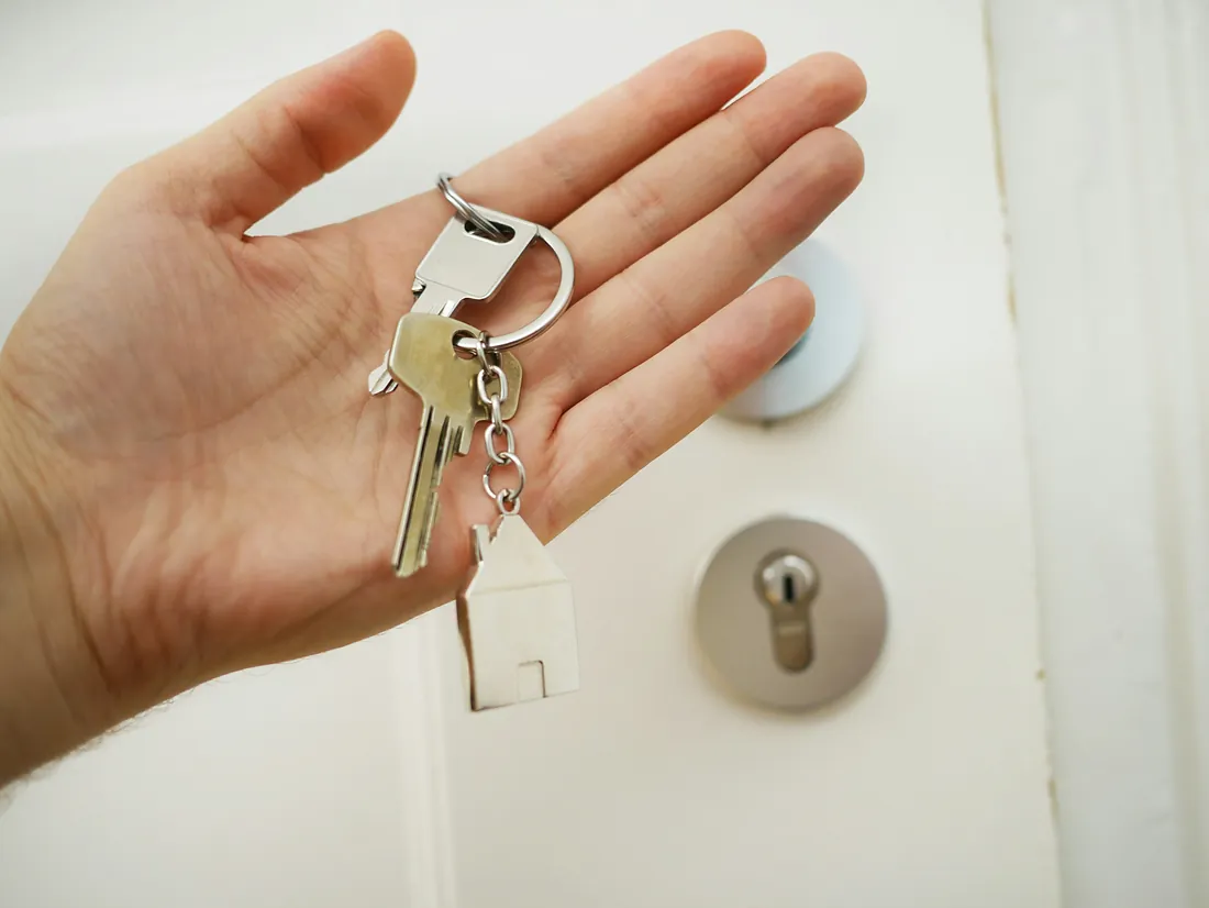 House keys in the palm of a hand - property transactions House keys in the palm of a hand - property transactions